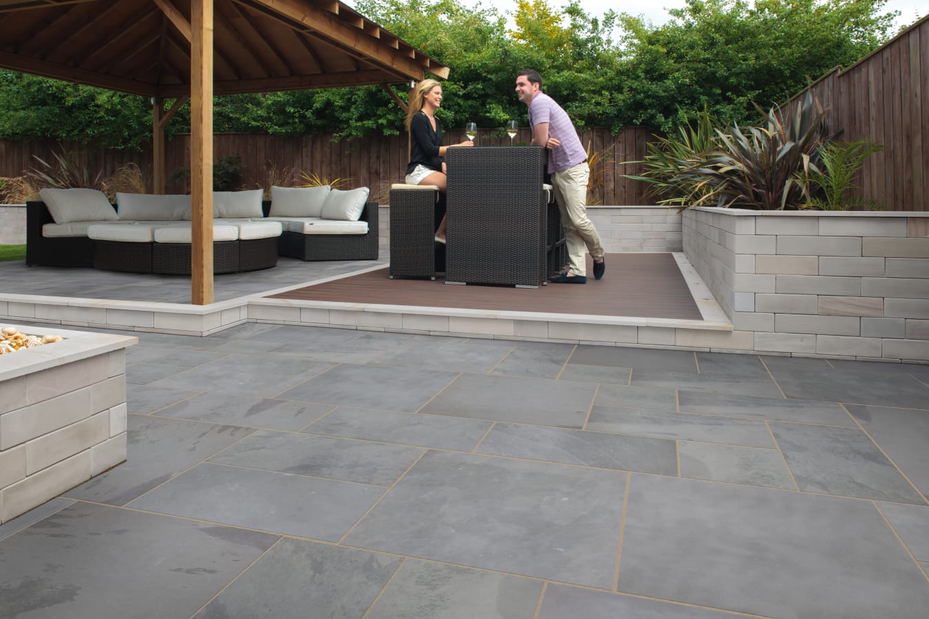Fairstone Slate Casarta® Two people enjoying a glass of wine at an outdoor table