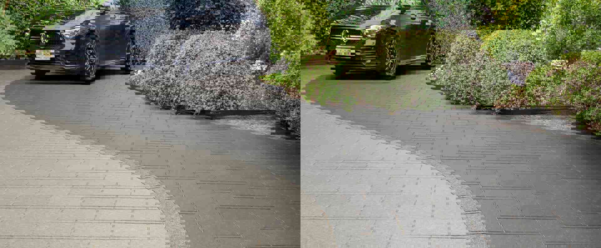 Black car parked on Marshalls Block Driveway Paving