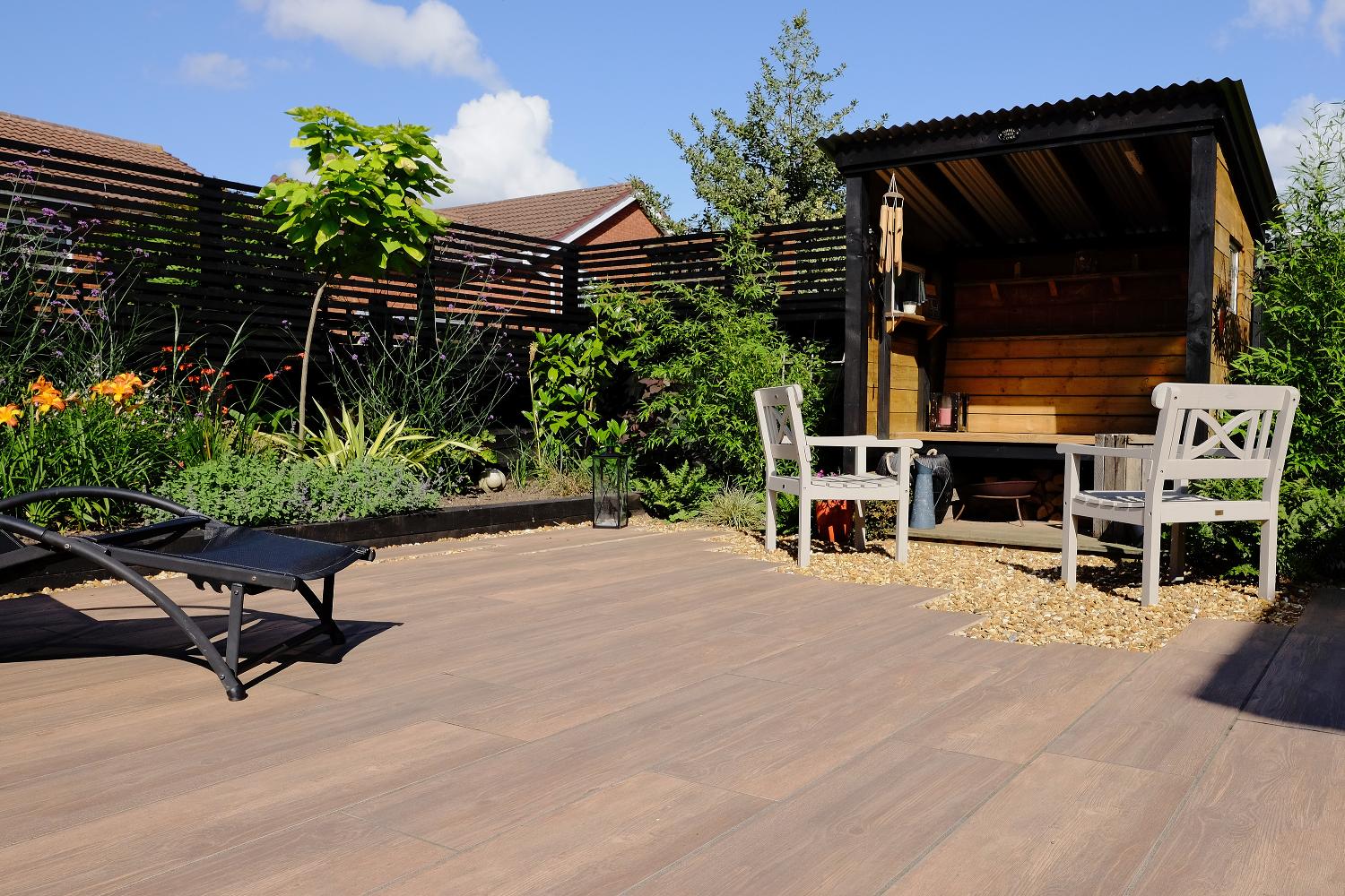 SYMPHONY® Plank in Oak A wooden outdoor seating area
