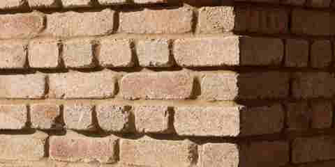 A close up of a wall built using Marshalls Glencoe Vintage Stock Facing Brick
